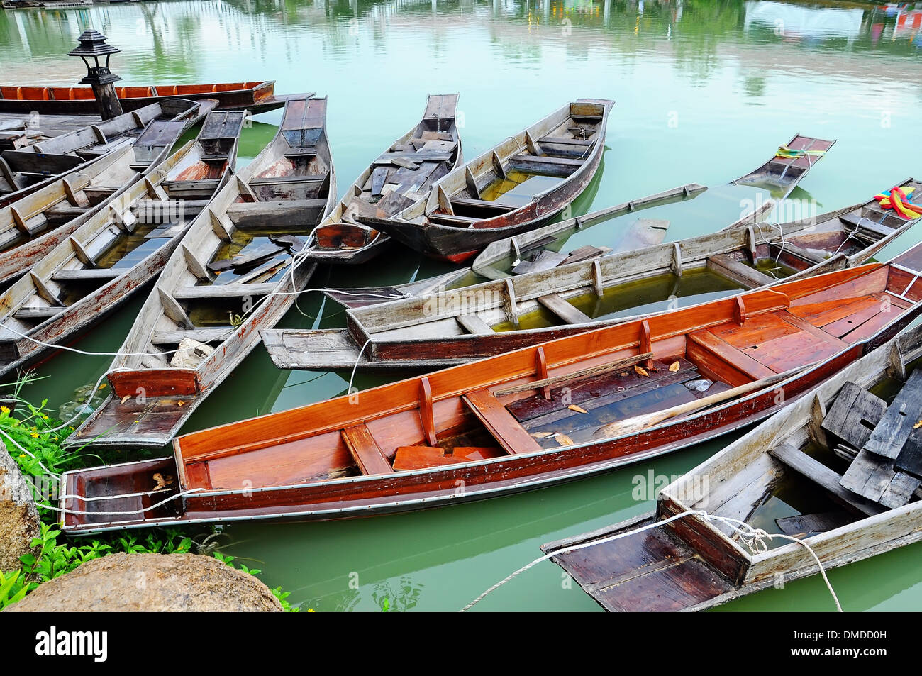 Group of wooden boats in the River Stock Photo - Alamy