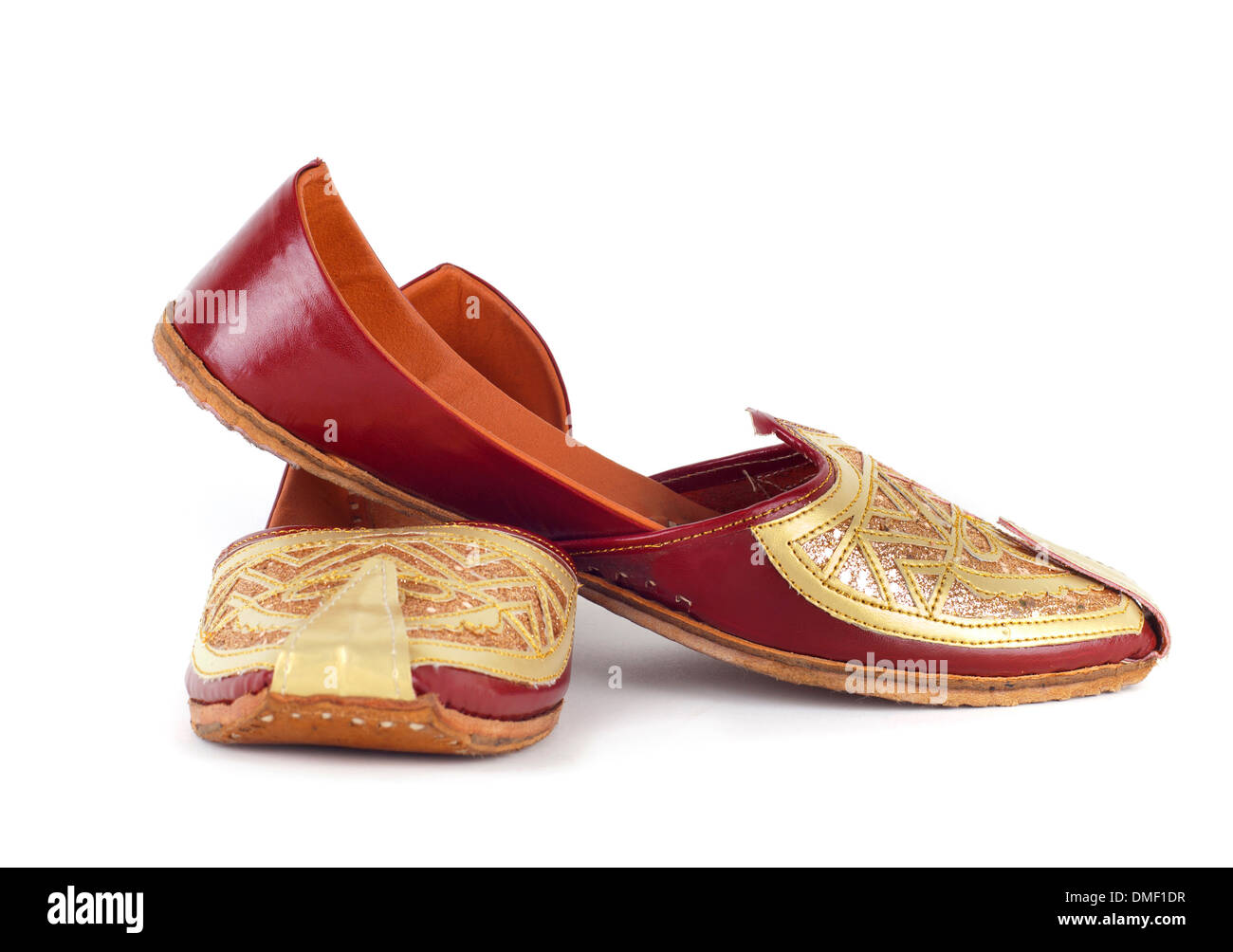 Pair of traditional Indian shoes on white background Stock Photo