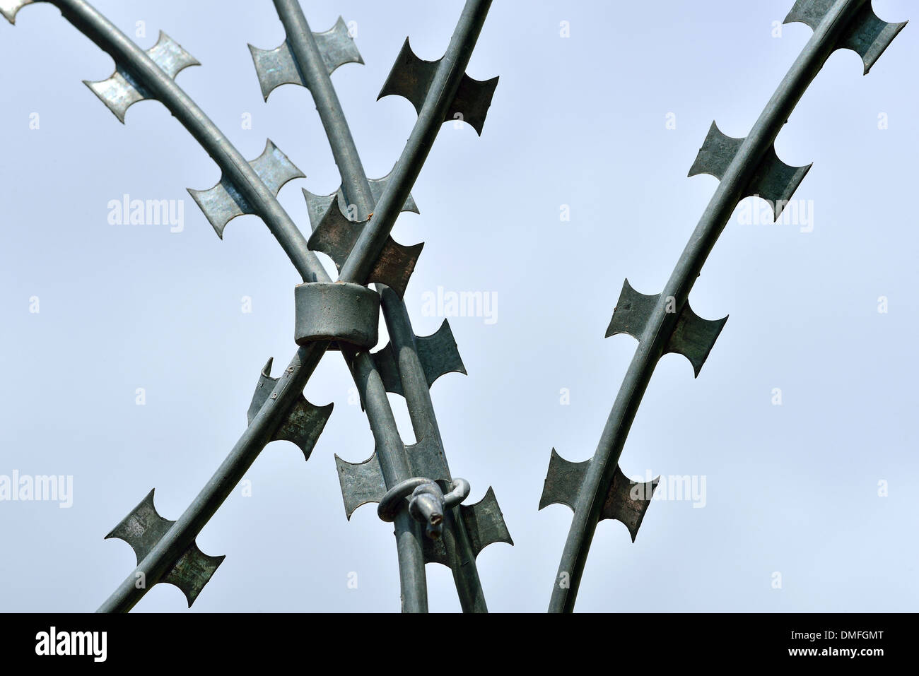 barbed and razor wire for security Stock Photo