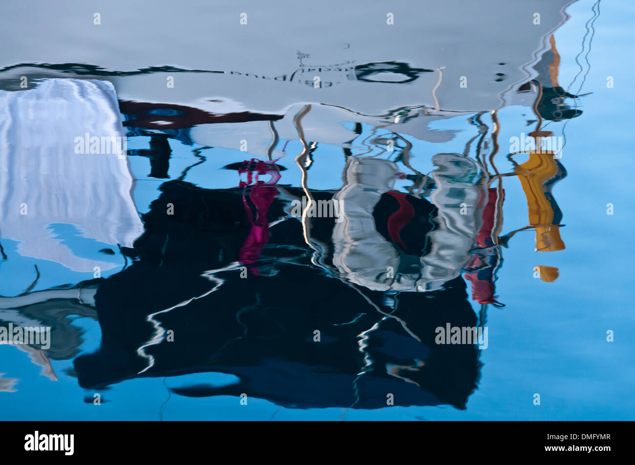 Reflections of a boat in water Stock Photo - Alamy