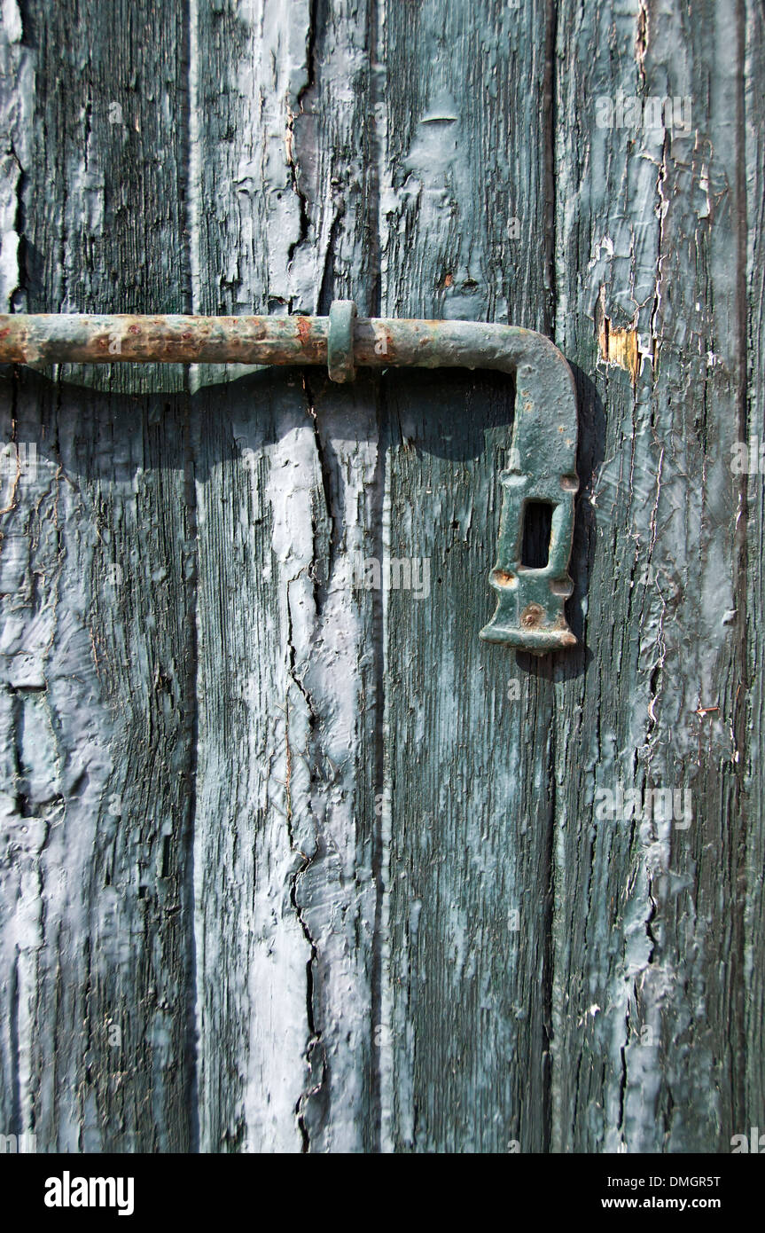 An old wooden door with a lock Stock Photo - Alamy
