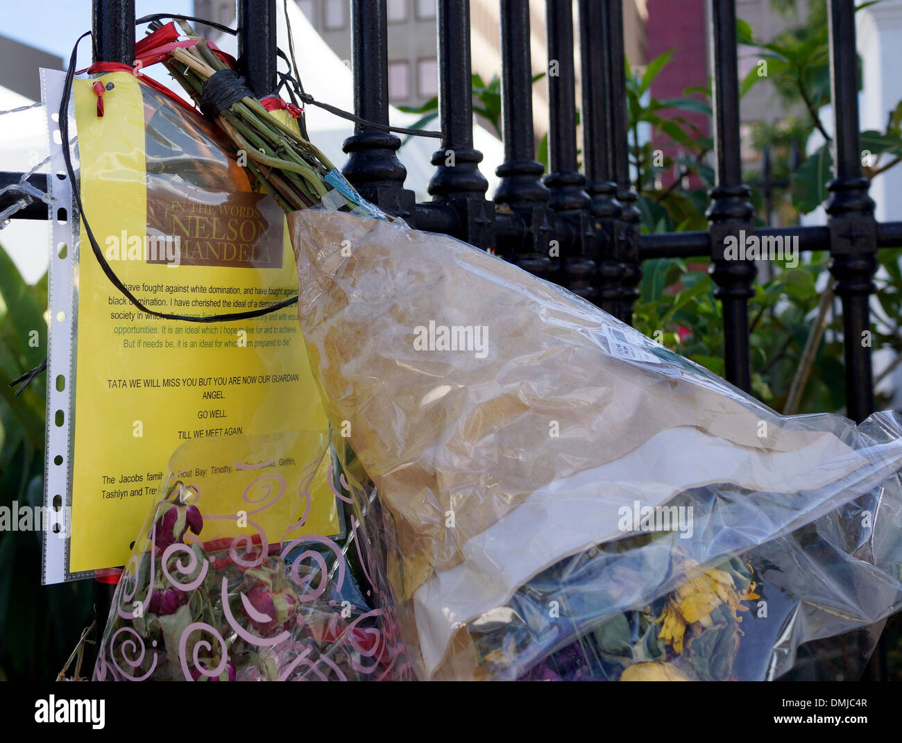 Floral tributes to Nelson Mandela have been tied to the railings outside the House of Parliament in Cape Town, South Africa. Stock Photo