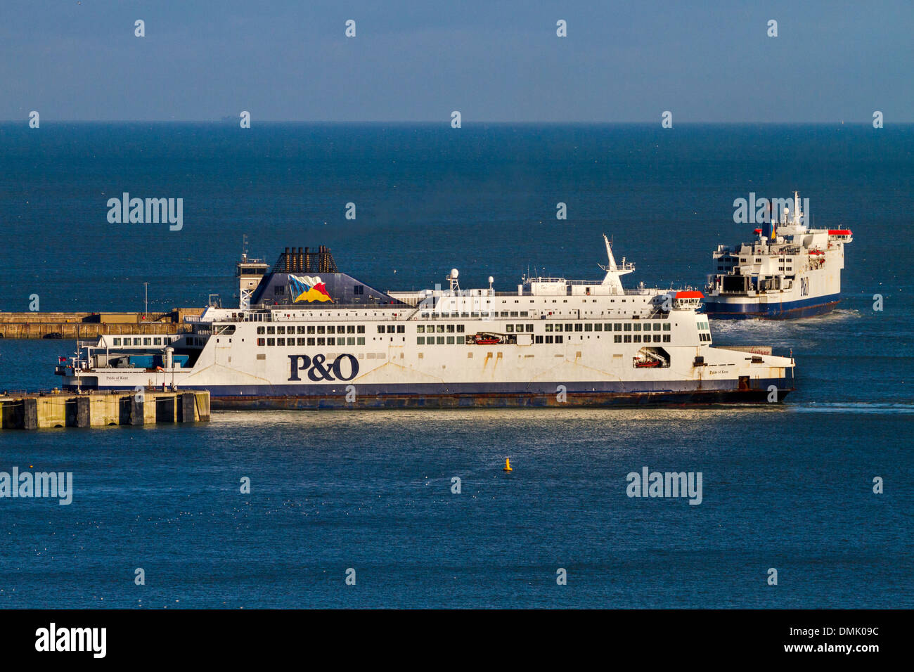 P&O ferry boats maneuver at the Port of Dover Ferry Terminal, Kent, UK Stock Photo