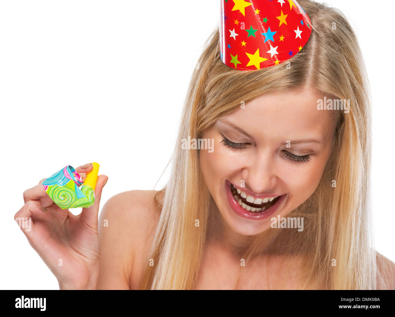 Portrait of smiling teenage girl in cap with party horn blower Stock ...