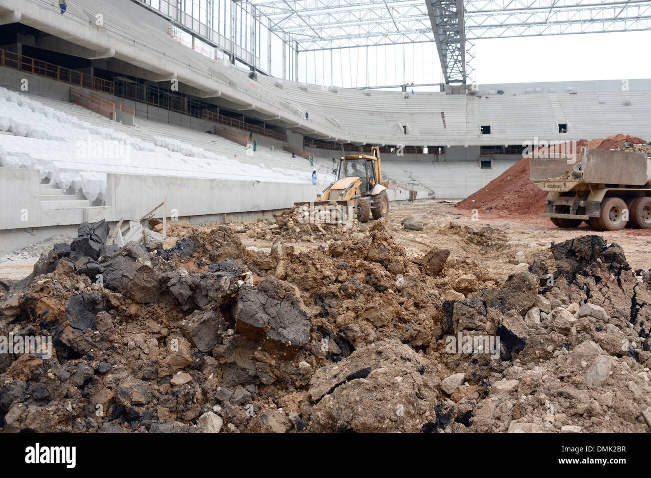 The soccer pitch which is currently under construction in the stadium 'Arena da Baixada' in Curitiba, Brazil, 14 December 2013. The Arena de Baixada is one of the stadiums for the FIFA World Cup 2014 in Brazil. Photo: Marcus Brandt/dpa Stock Photo