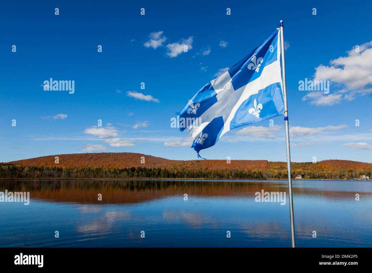 FLAG OF QUEBEC FLOATING OVER LACFRONTIERE, INDIAN SUMMER, AUTUMN