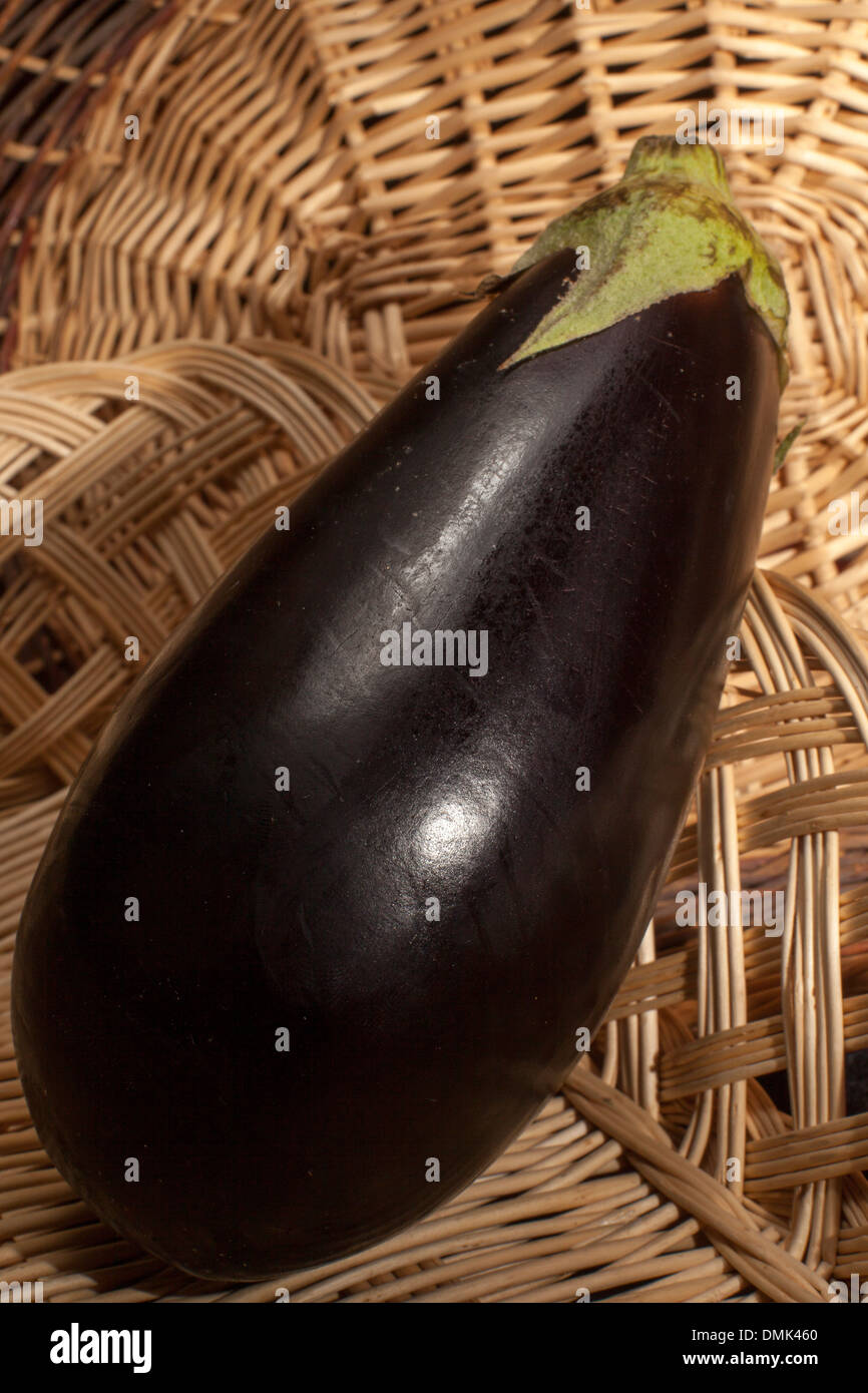 aubergine in a wicker basket Stock Photo - Alamy
