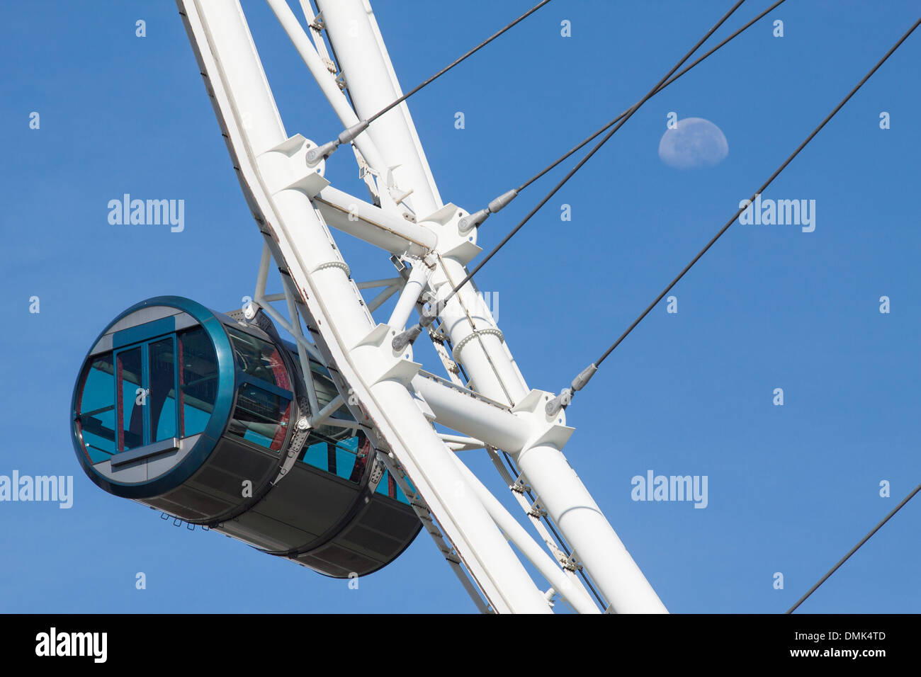 FACE TO FACE, THE MOON AND ONE OF THE CARRIAGES ON THE FERRIS WHEEL SINGAPORE FLYER, MARINA BAY, SINGAPORE Stock Photo
