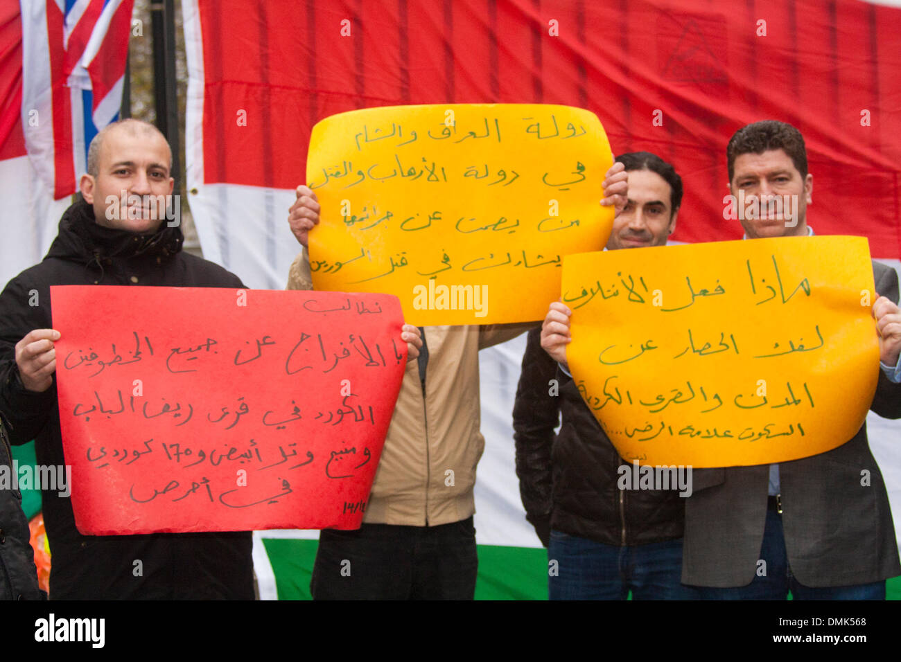 London, UK. 14th December 2013. Protesters display their placards as Kurds demand that the Kurdish issue in Syria is added to the agenda of the January 2014 Geneva II peace conference. Credit:  Paul Davey/Alamy Live News Stock Photo