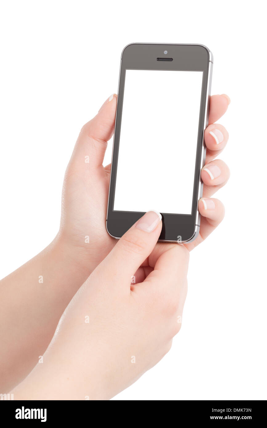 Female hands holding black modern smart phone with blank screen and pressing button by the thumb. Isolated on white background. Stock Photo