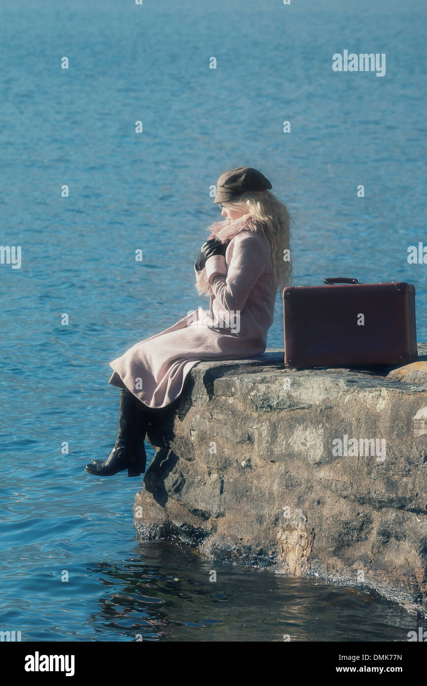 Girl jetty suitcase hi-res stock photography and images - Alamy