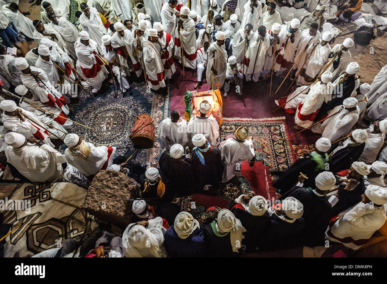 Priest celebrating Orthodox Easter inside a temple, Lalibela, Ethiopia