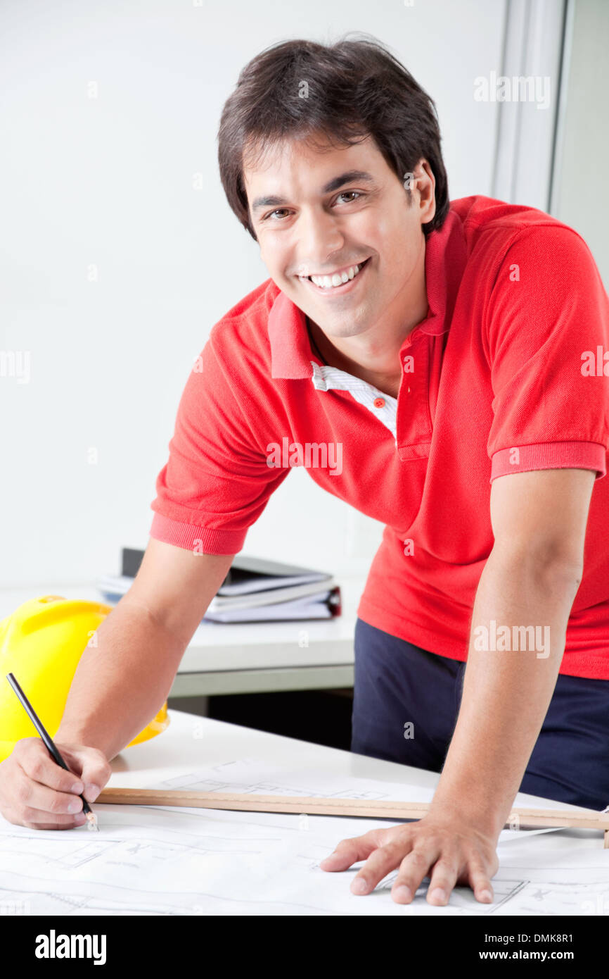 Architect Working on Blueprints Stock Photo