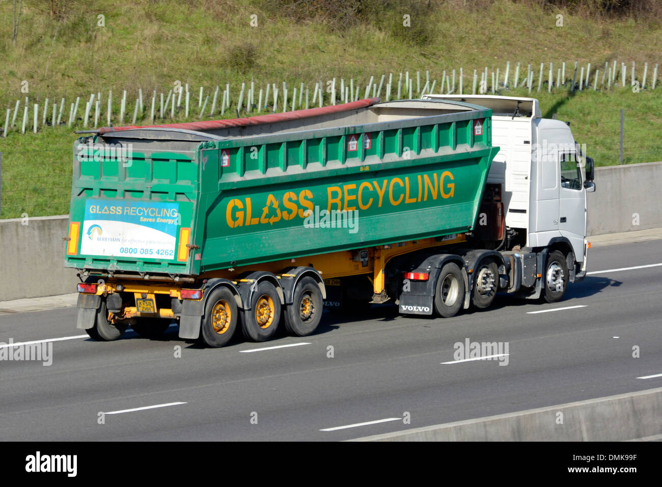 Glass recycling lorry with trailer on motorway Stock Photo