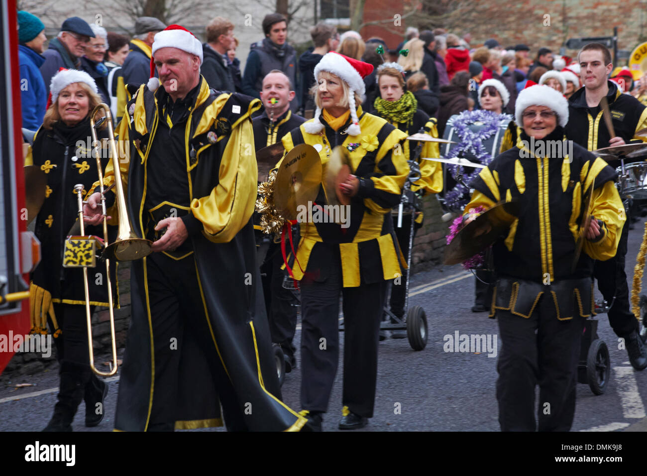 Wimborne, Dorset, UK. 14th December 2013. Crowds turn out to watch the 25th Wimborne Save The Children Christmas Parade. Gugge 2000, Gugge2000, Swiss style guggemusik band. Credit: Carolyn Jenkins/Alamy Live News Stock Photo