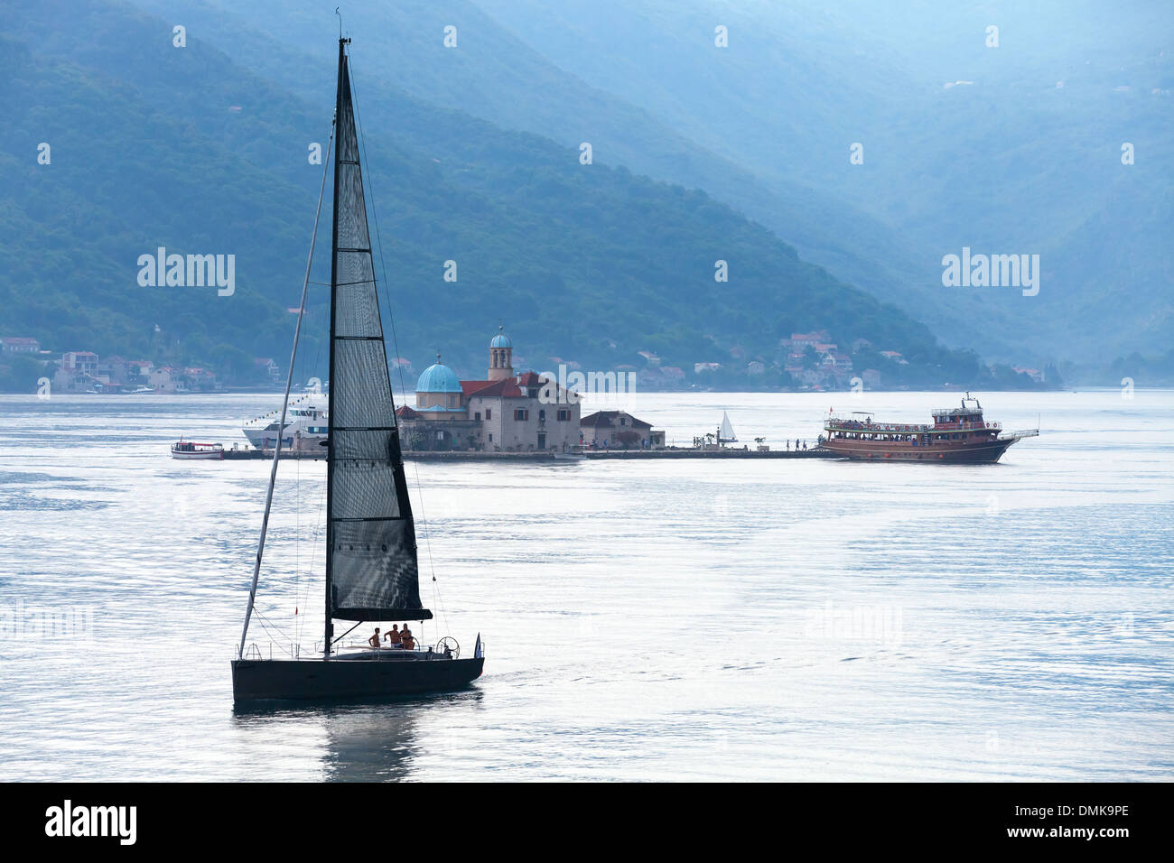 Bay of Kotor. Small island and sailing yacht Stock Photo