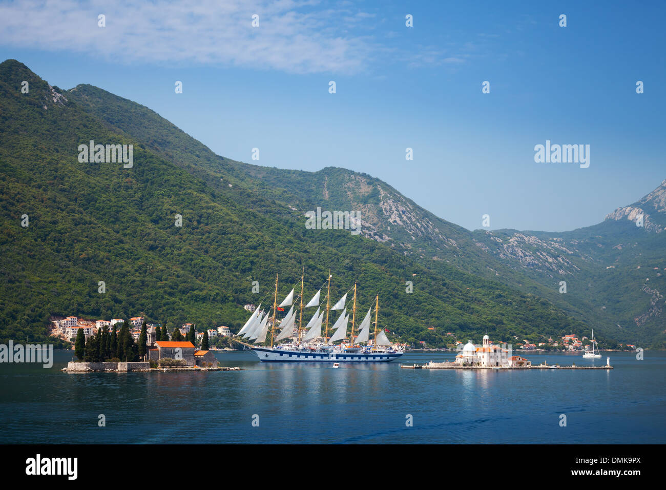 Bay of Kotor. Small islands and big sailing ship Stock Photo