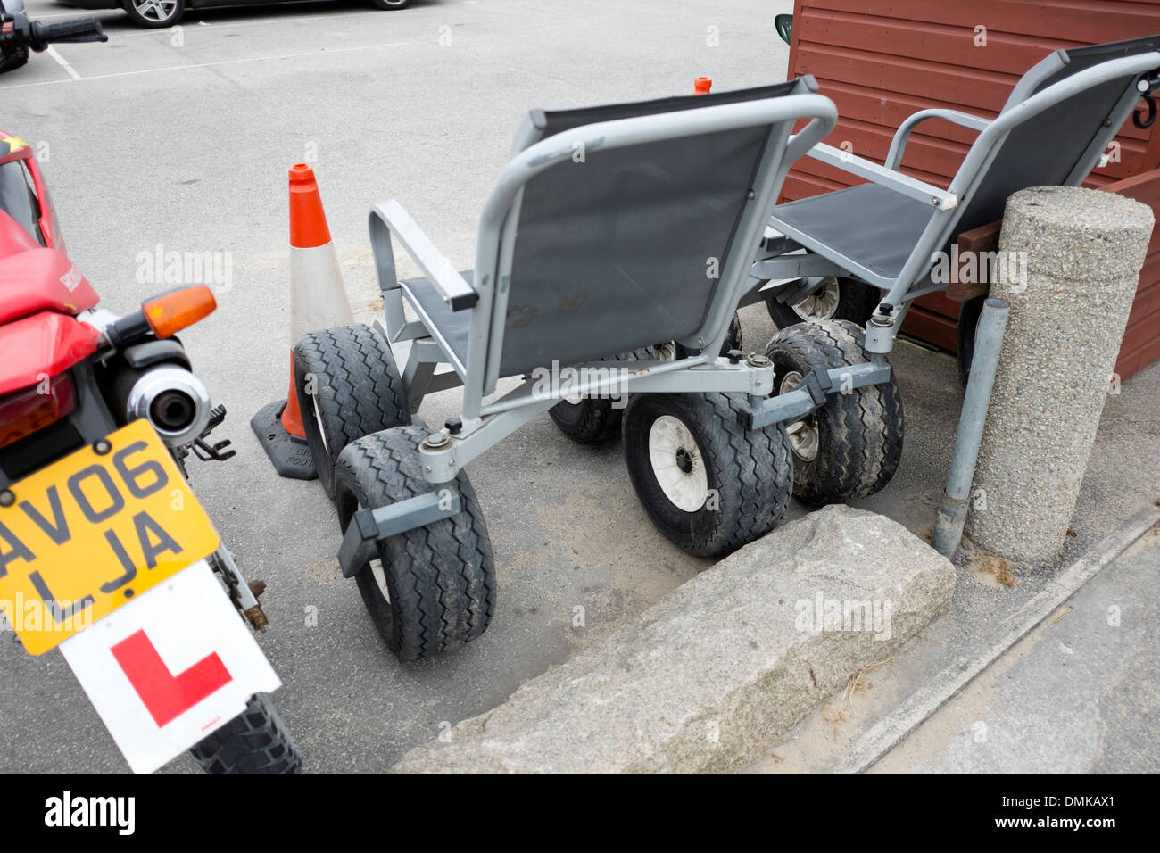 Disabled off road beach wheelchair wide wheels Stock Photo Alamy