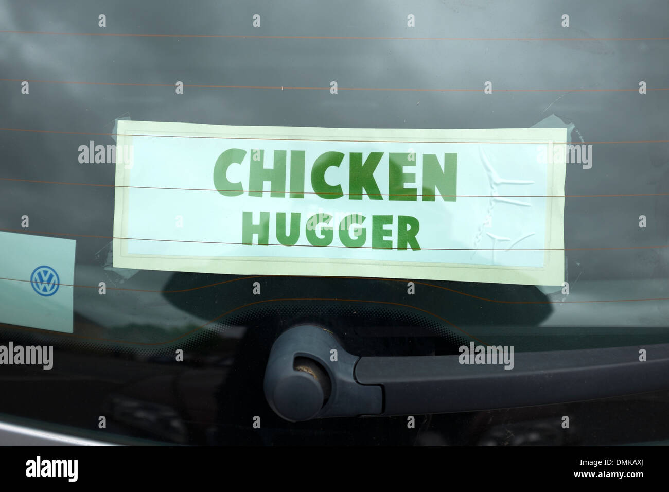 Chicken Hugger funny Sign Love animals anti cruelty Stock Photo