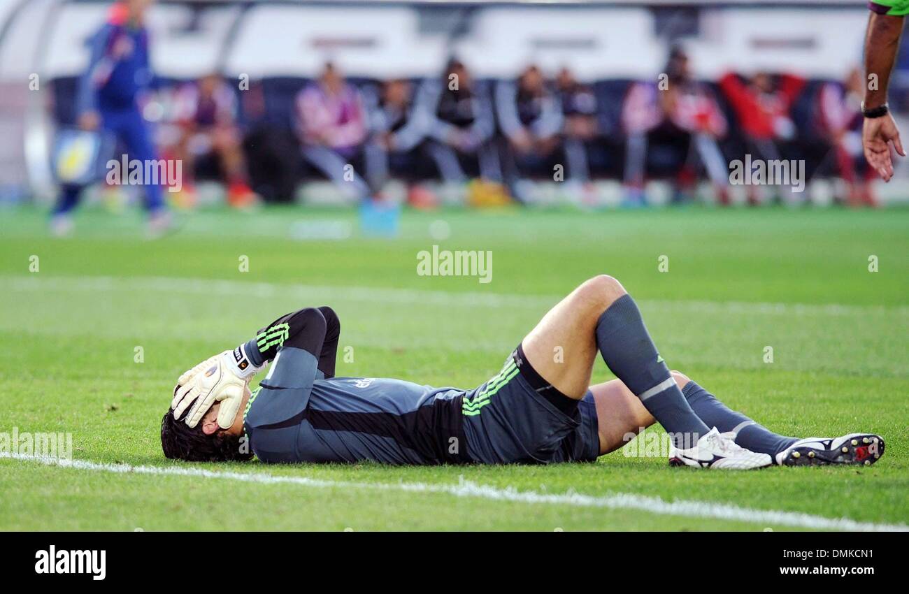 Agadir, Morocco. 15th Dec, 2013. Goalkeeper Sherif Ekramy of Egypt's Al Ahly reacts after failing to save a goal during the match against China's Guangzhou Evergrande at the FIFA's 2013 Club World Cup soccer match in Agadir, Morocco, Dec. 14, 2013. Guangzhou Evergrande won the match 2-0. Credit:  Liu Dawei/Xinhua/Alamy Live News Stock Photo