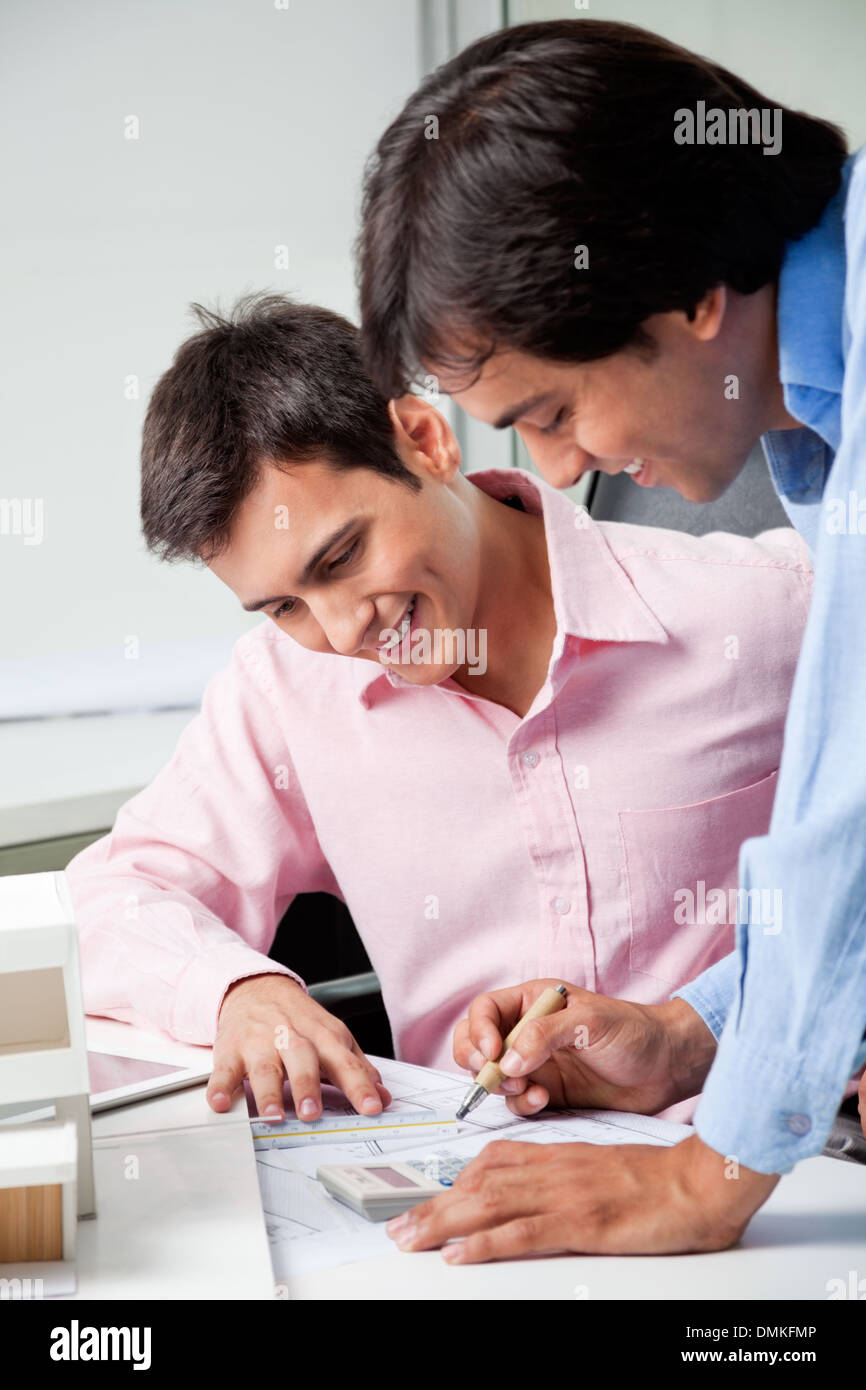 Architects Doing Some Calculations Stock Photo