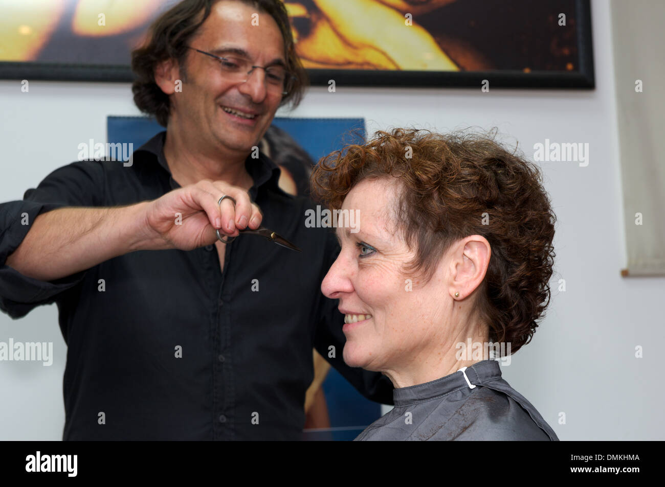 Woman having a haircut Stock Photo