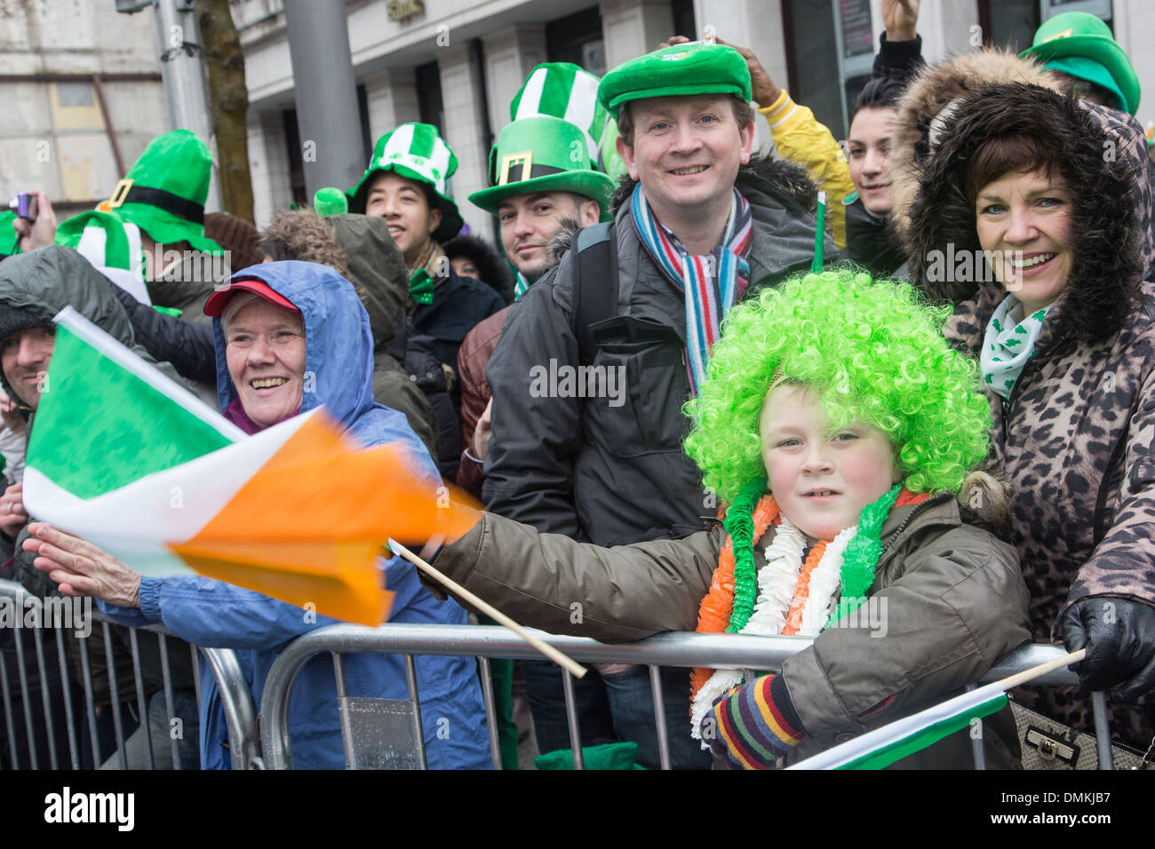 SPECTATORS WEARING THE GREEN COLOUR OF THE IRISH CLOVER, SAINT PATRICK‚ÄôS DAY, DUBLIN, IRELAND Stock Photo