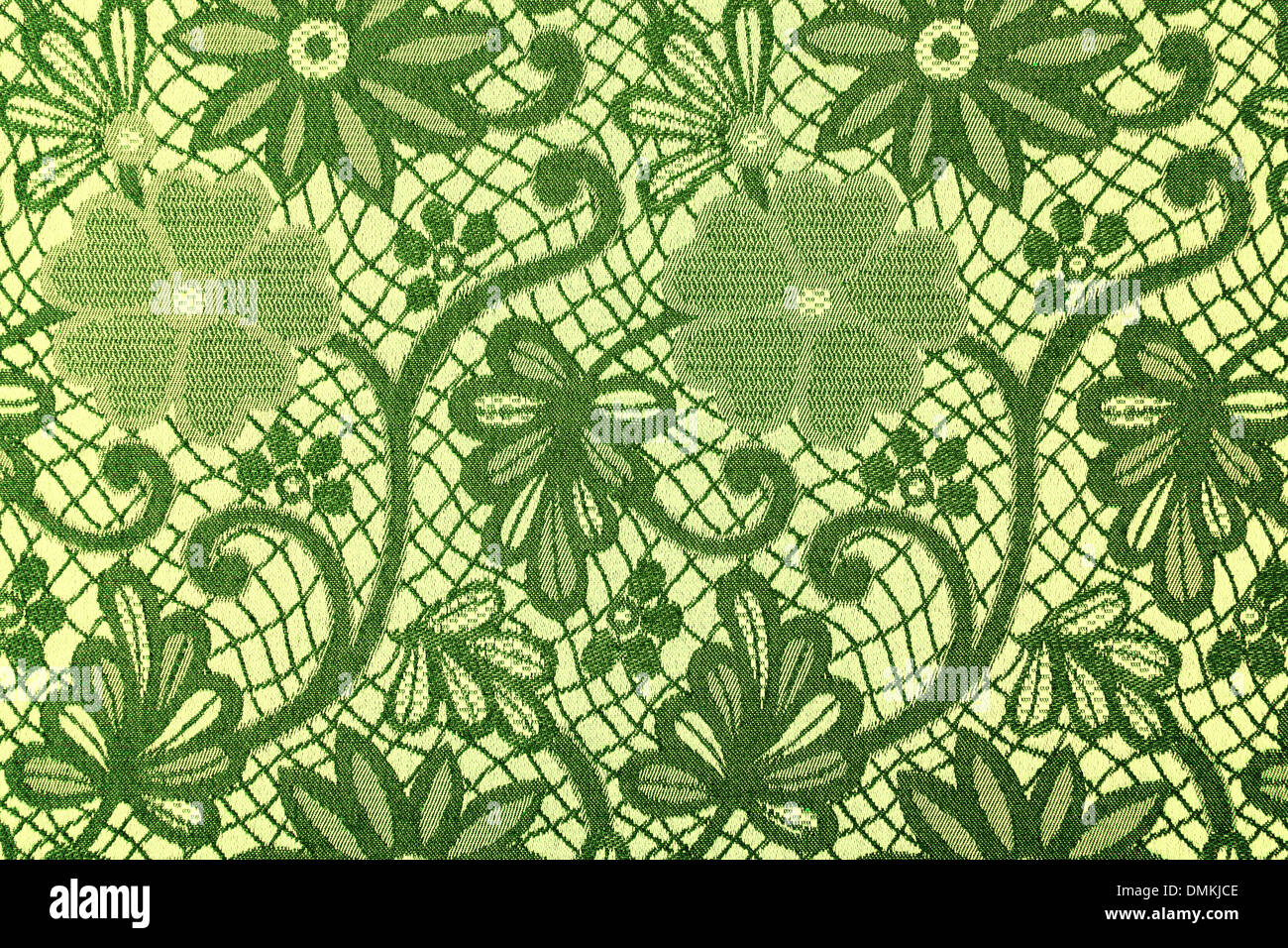 Green flowers on a textile background Stock Photo