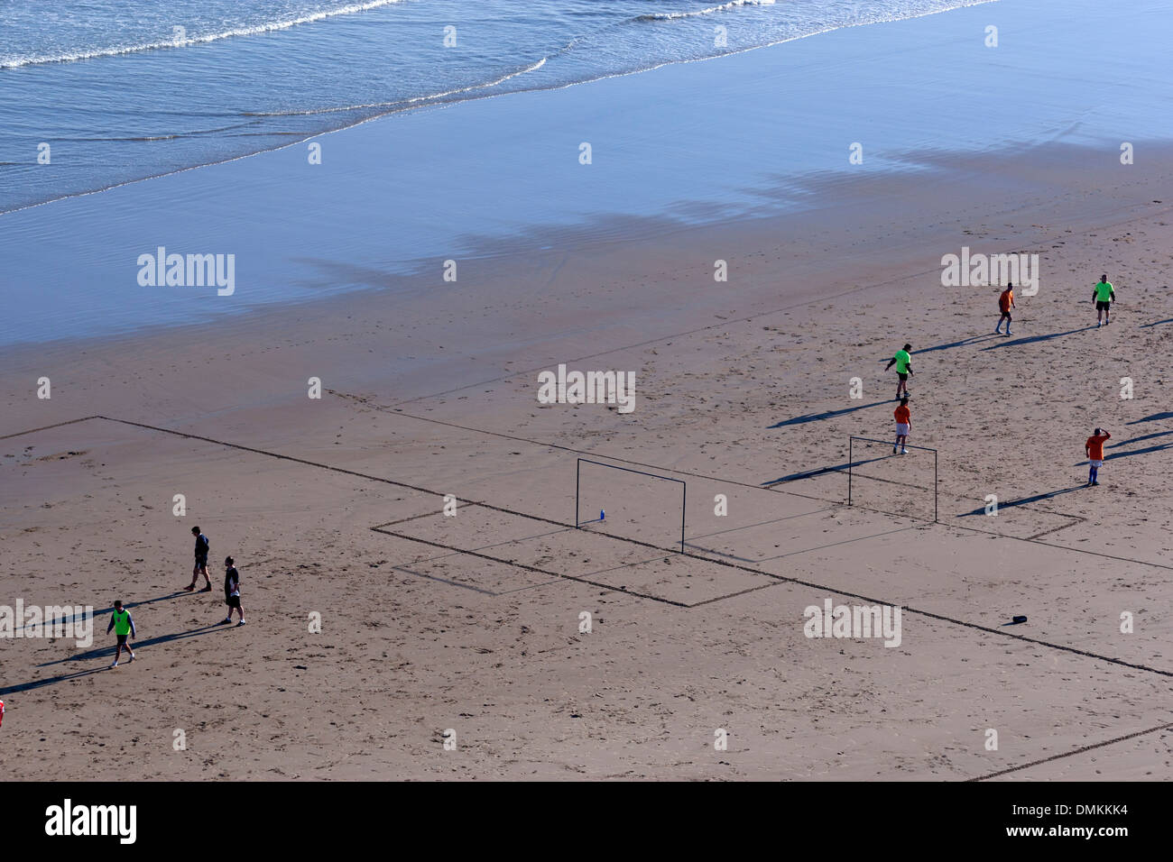 Two football match at the same time in La Concha beach, Suances Cantabria. Stock Photo