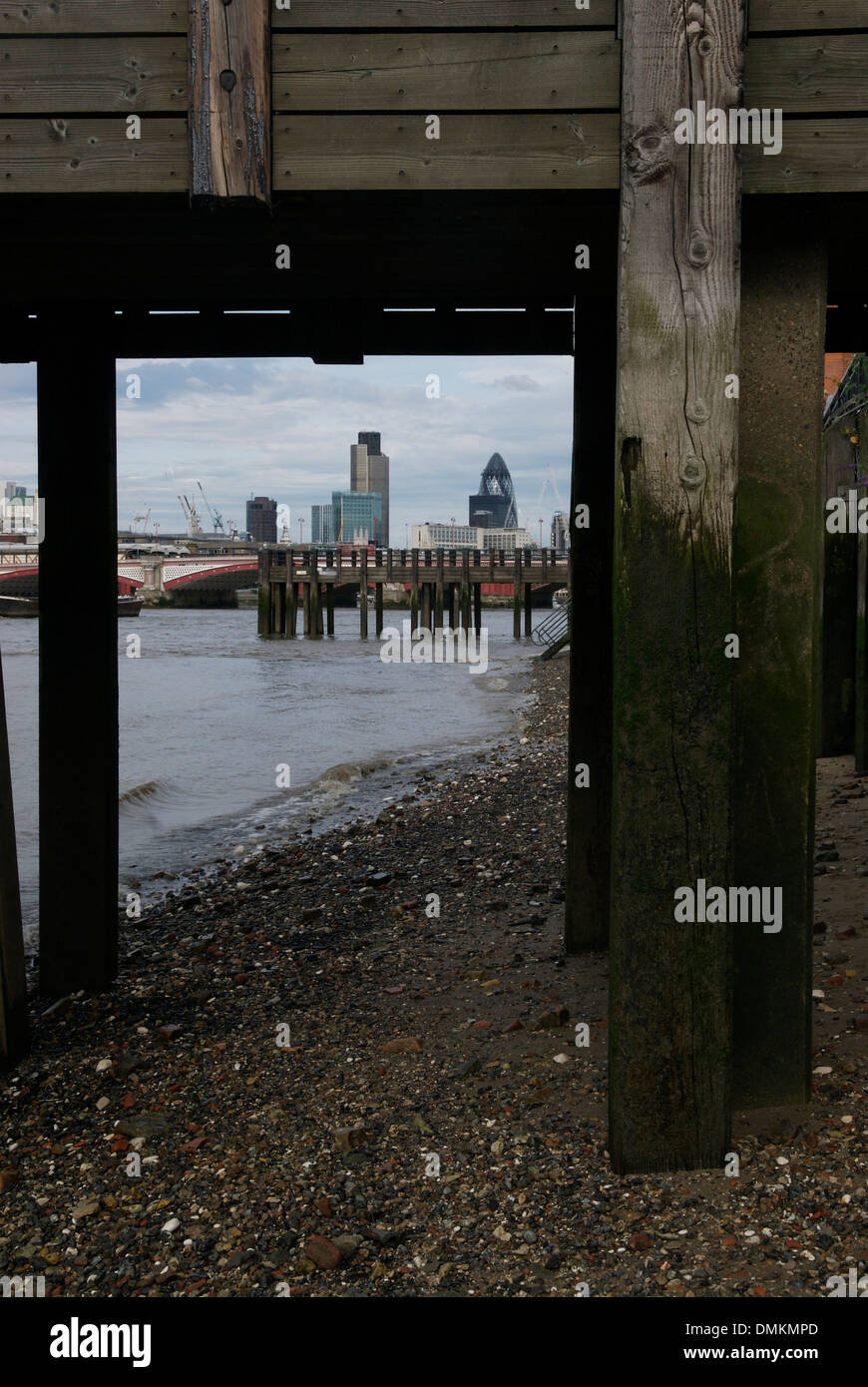 View of the City of London from beneath the wharf at the Oxo Tower, Bankside, London, UK. Stock Photo