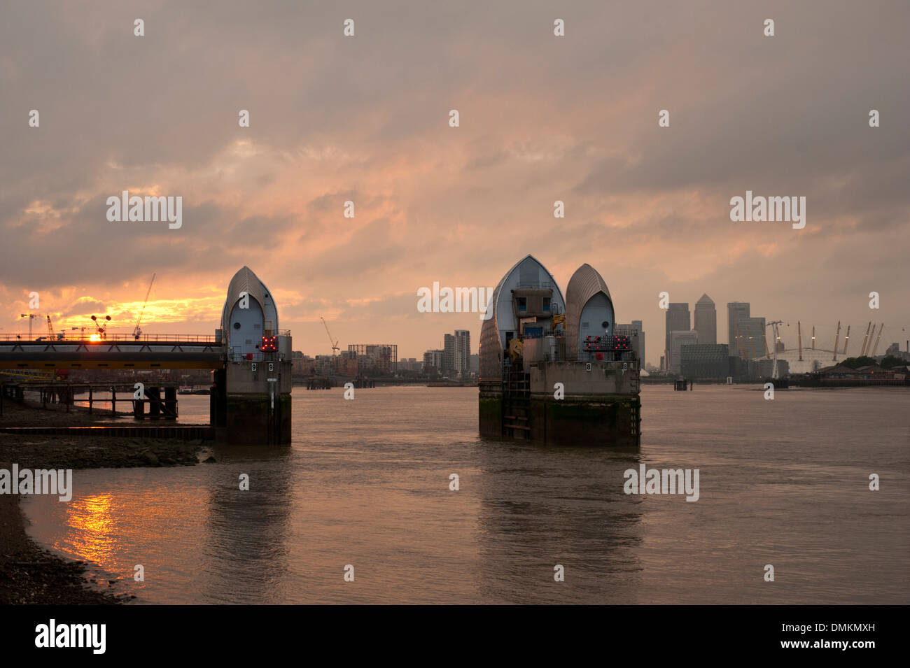 View of the Thames Barrier, a movable flood barrier, at sunset, Woolwich Reach, Woolwich, Royal Borough of Greenwich, London, UK Stock Photo