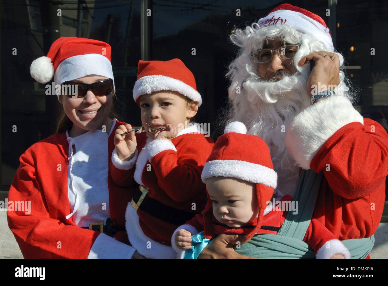 family takes part in Santacon celebration during christmas season in san francisco Stock Photo