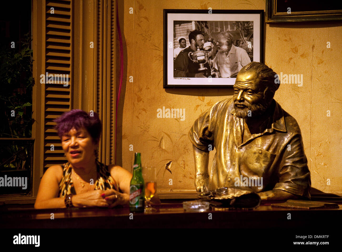 Floridita bar interior, with statue of Ernest Hemingway and a local patron, Havana, Cuba caribbean, Latin America Stock Photo