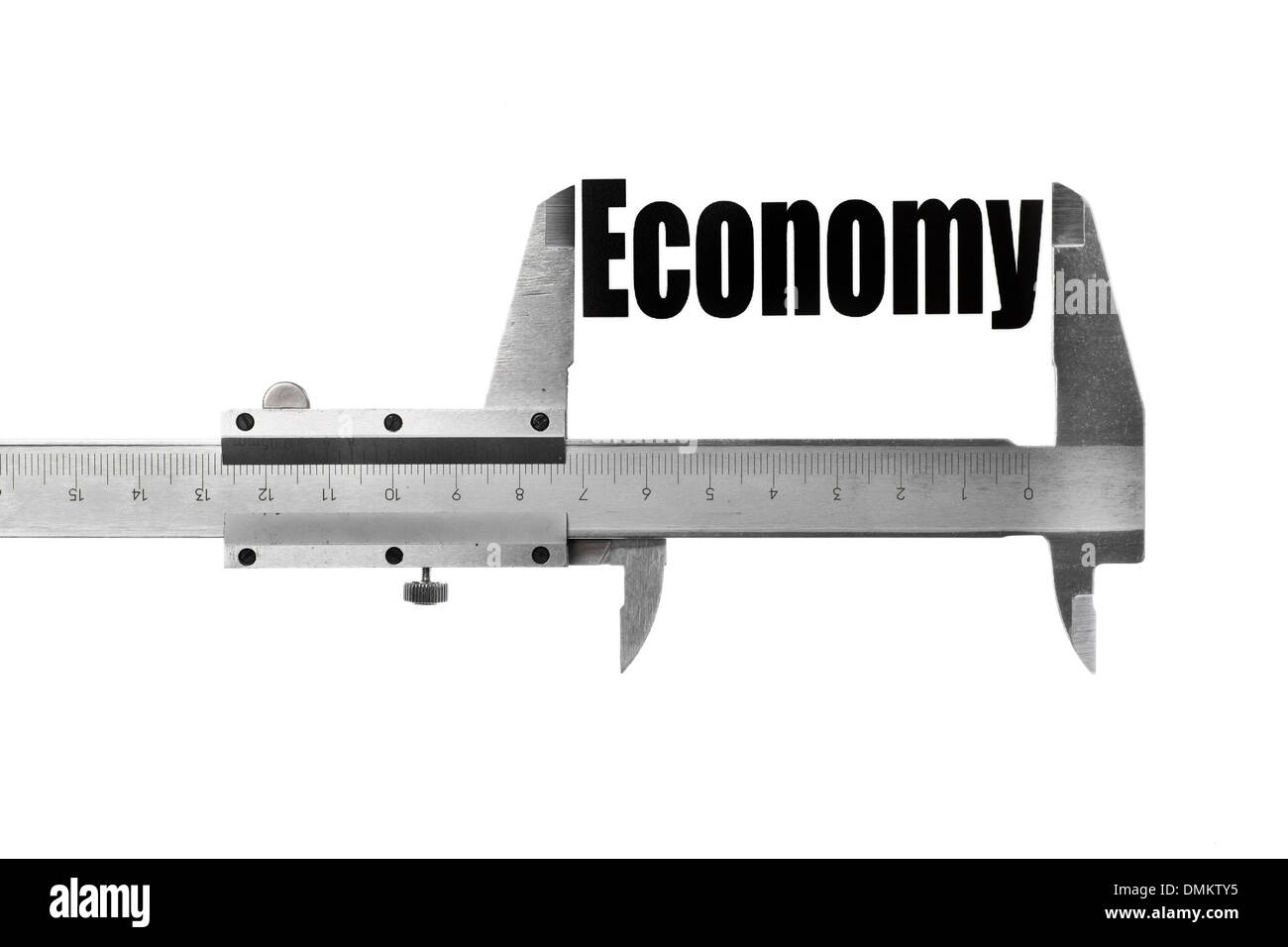 Close up shot of a caliper measuring the word 'Economy' Stock Photo