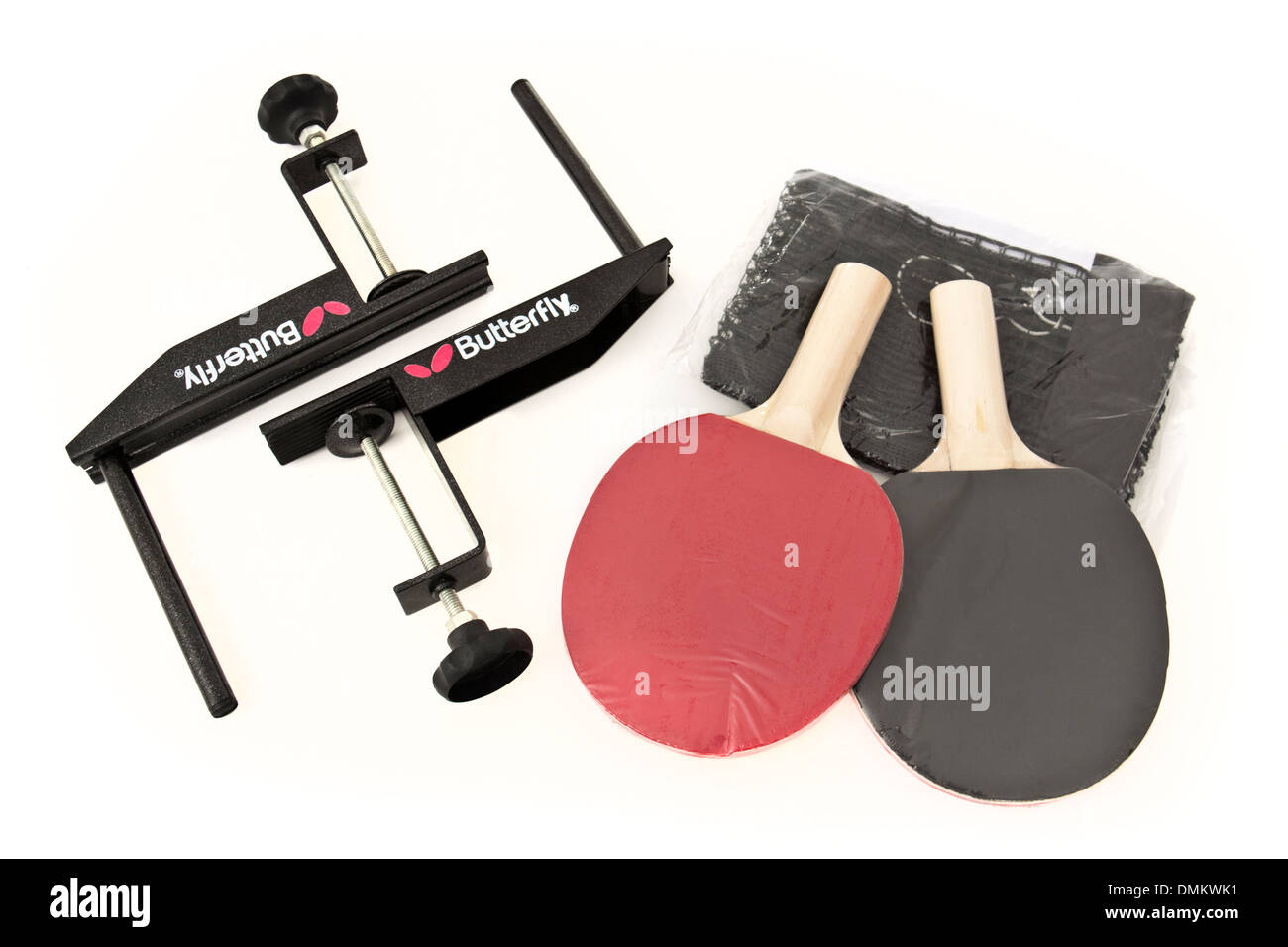 Table tennis set, including a pair of rackets, table clamps and net Stock Photo