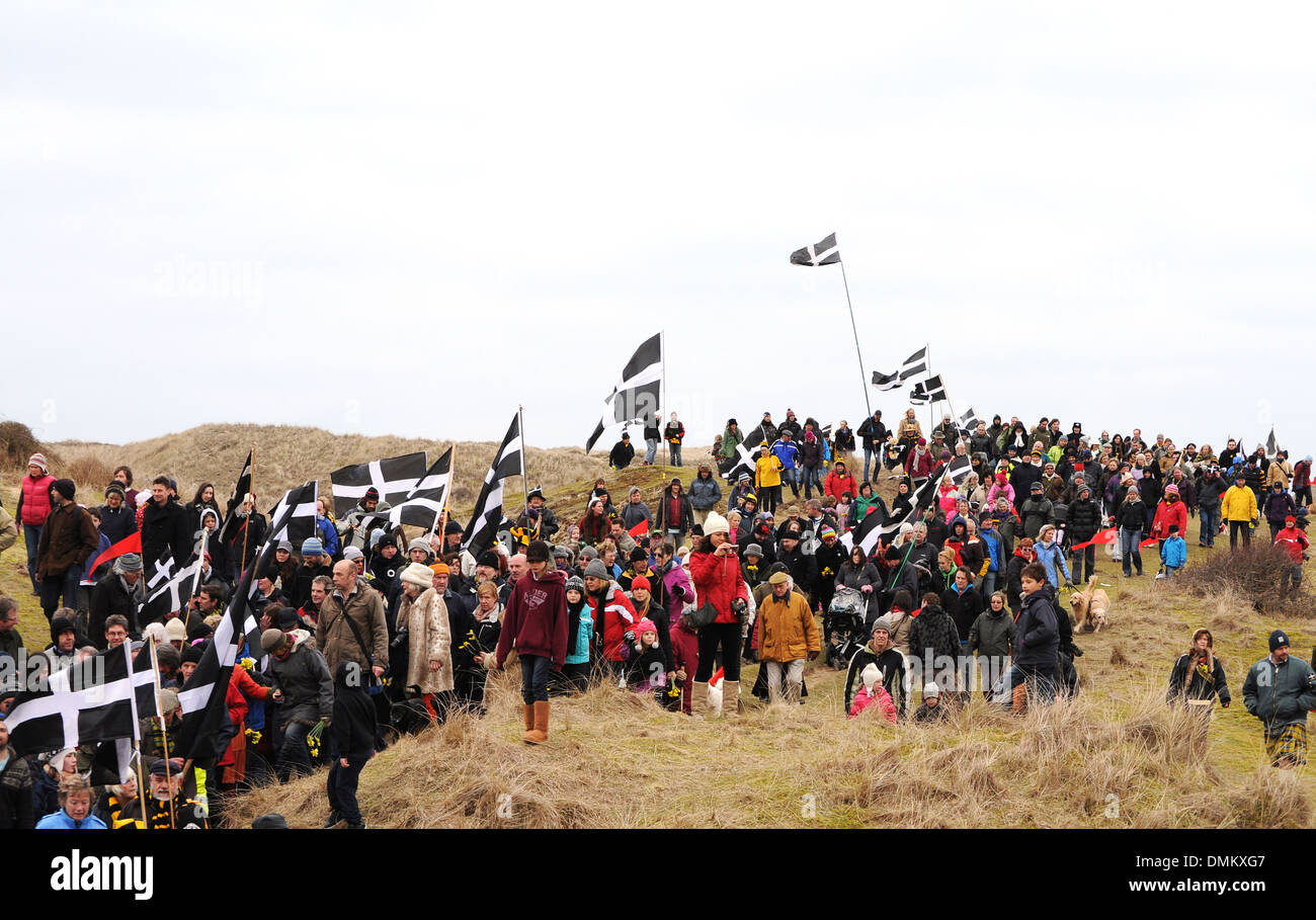 cornish people marching through the dunes at perranporth in cornwall on st.pirans day Stock Photo