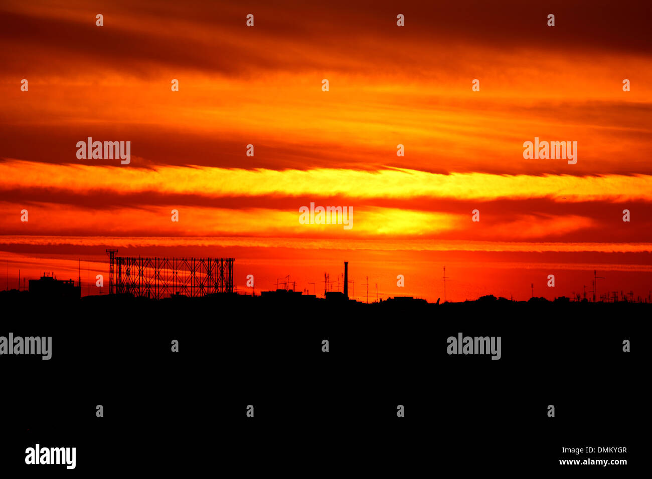View of Rome at sunset with the silhouette of the gasometer of shore Ostiense Stock Photo