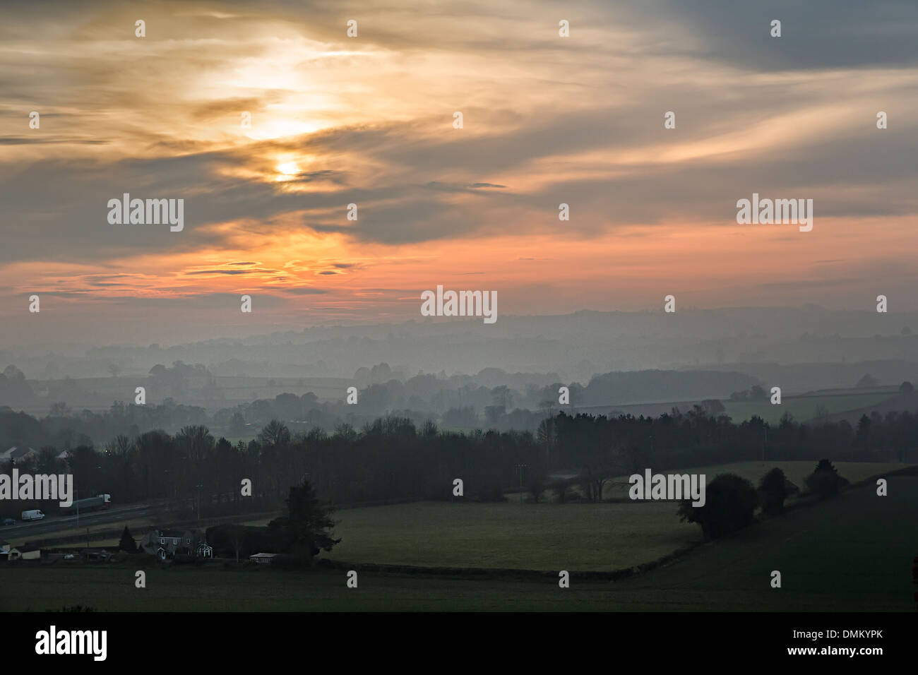 Misty sunset, Raglan, Wales, UK Stock Photo