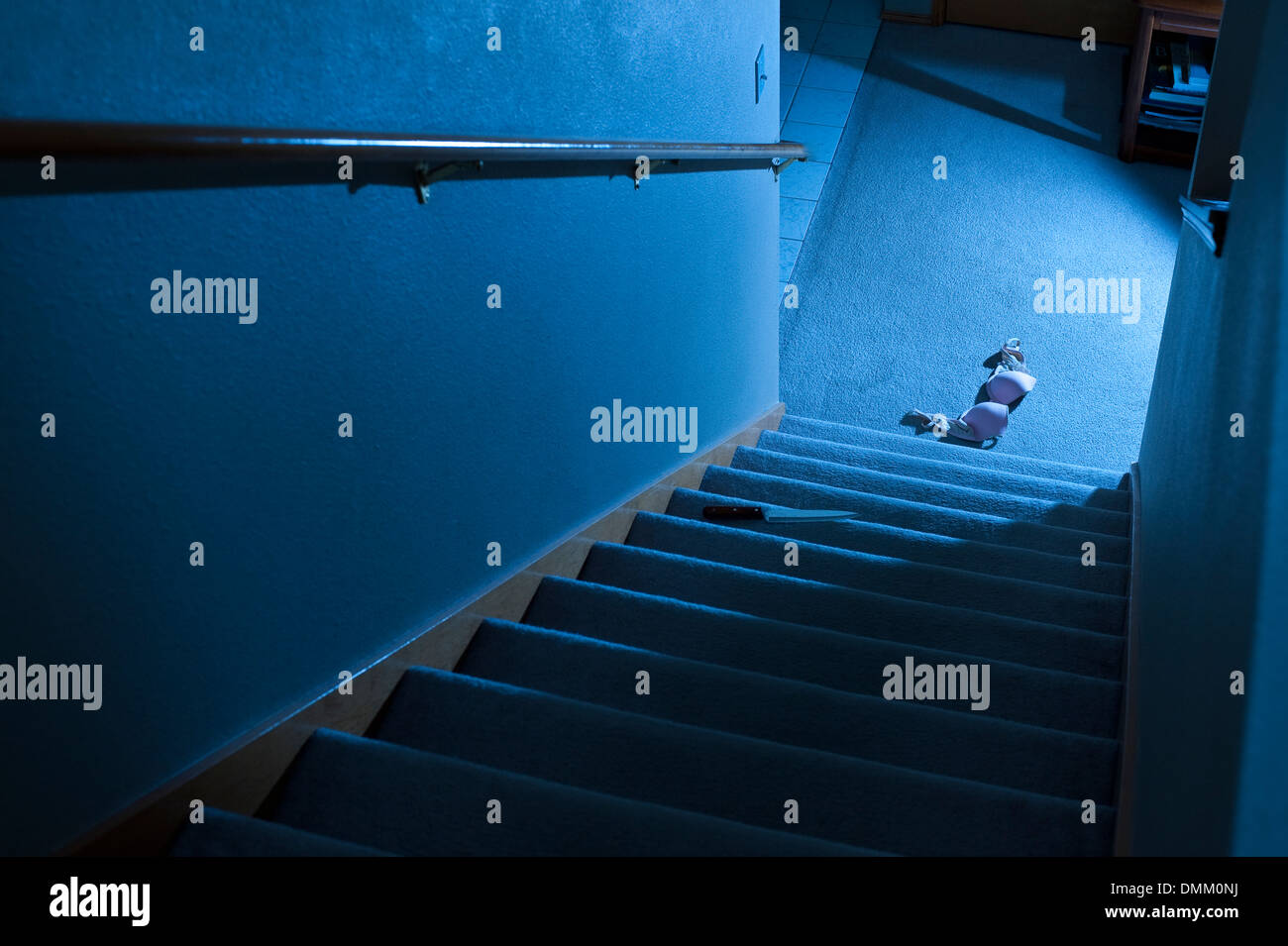 Interior of house with bra at bottom of stairs Stock Photo Alamy