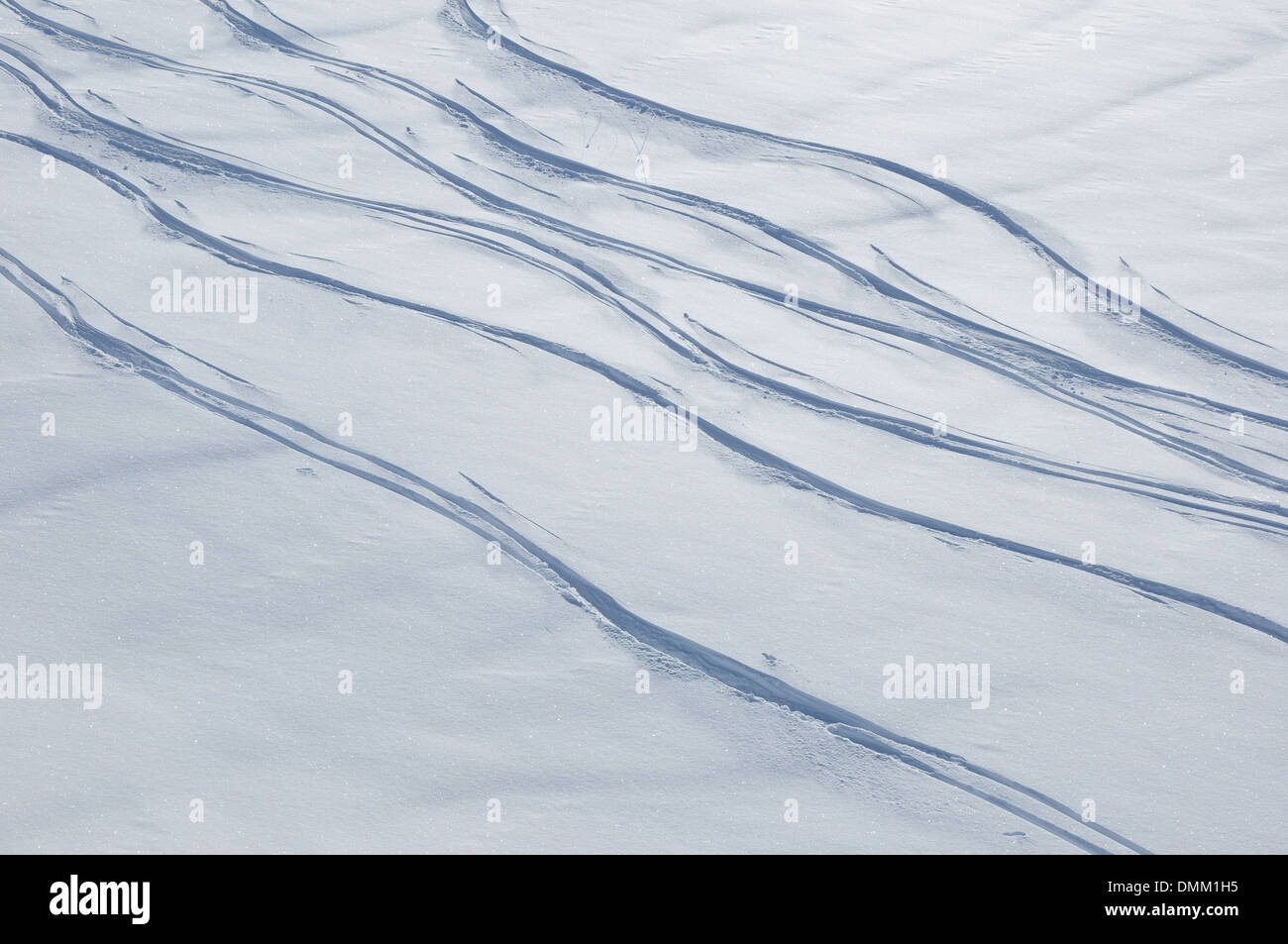 Snow background with ski tracks in Dolomites Alps, Italy, Europe Stock Photo
