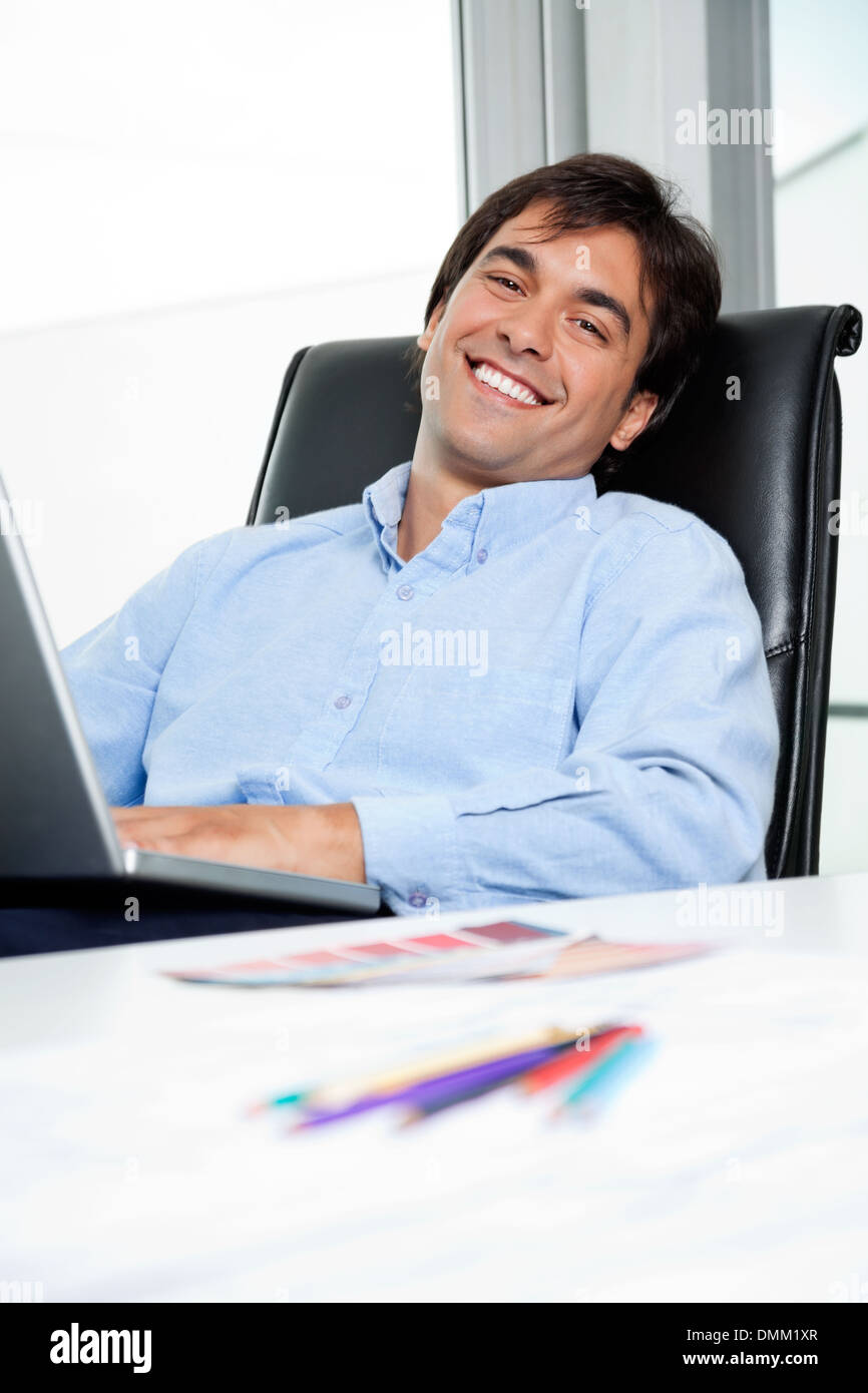 Interior Designer Using Laptop Stock Photo - Alamy