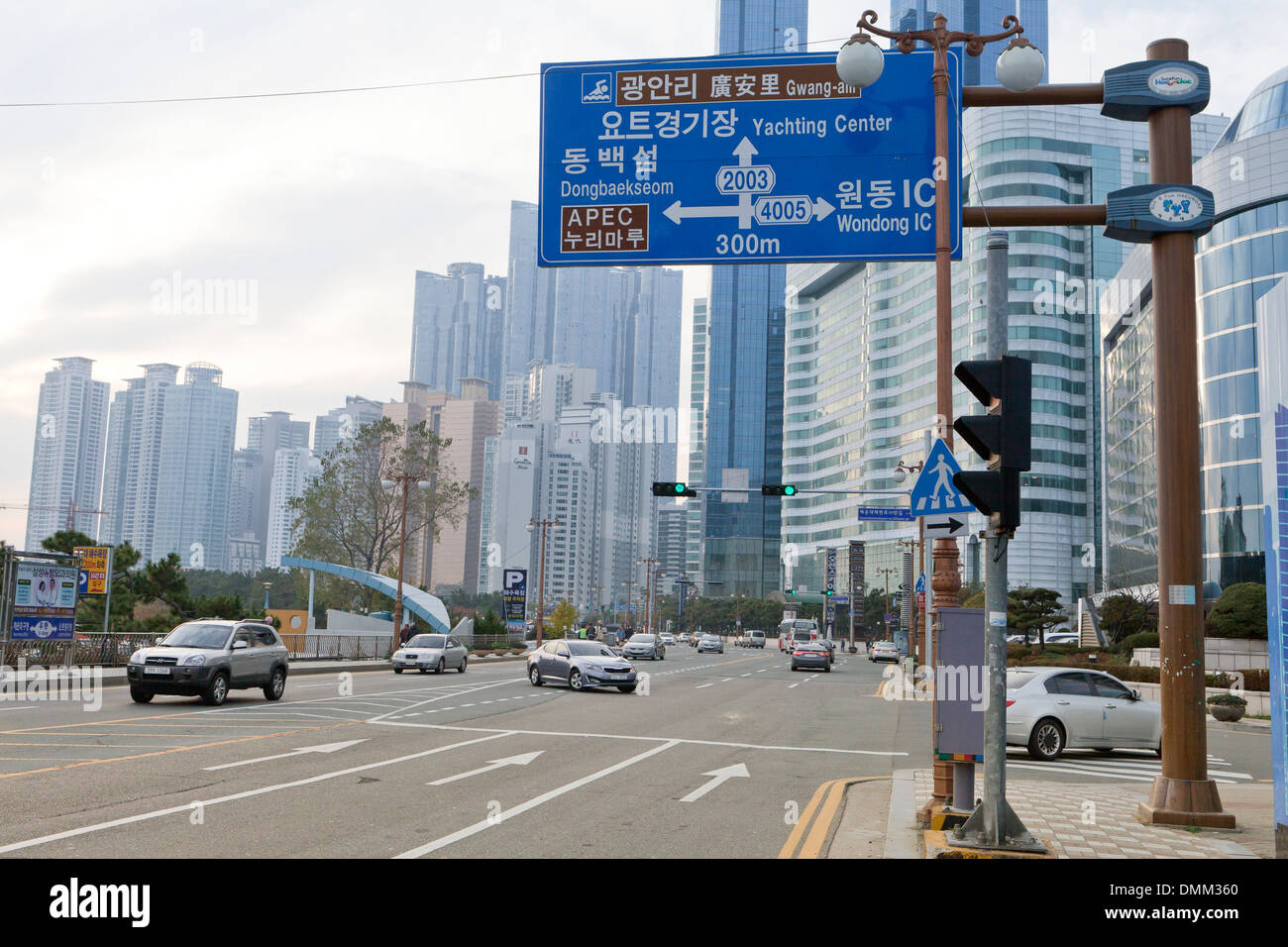 Blue directional traffic sign - Busan, South Korea Stock Photo
