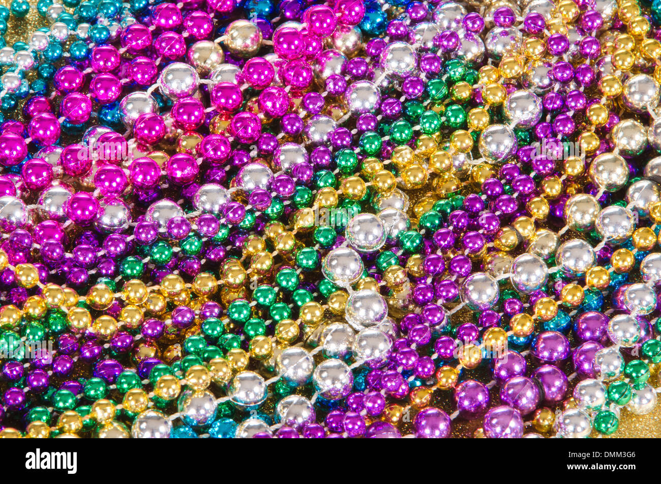 why are there beads at mardi gras