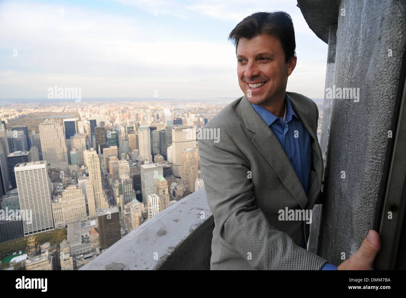 Nov 04, 2009 - Manhattan, New York, USA - New York Yankee great and four-time World Series champion TINO MARTINEZ, looking from the 103rd floor parapet, lights and tours the Empire State Building to wish the Bronx Bombers good and celebrate the playing of Game 6 against the Philadelphia Phillies at Yankee Stadium tonight.  (Credit Image: Â© Bryan Smith/ZUMA Press) RESTRICTIONS:  *  Stock Photo