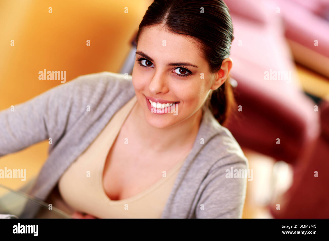 Closeup portrait of a young happy woman at home Stock Photo - Alamy