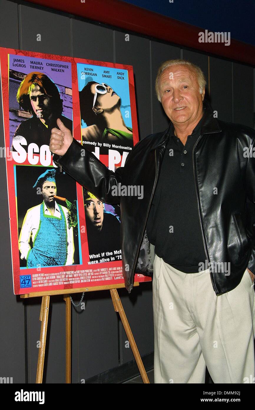 Feb. 4, 2002 - Hollywood, CA, USA - ROBERT LOGGIA POINTS TO THE PICTURE OF HIS SON-IN-LAW JAMES LEGROS WHO IS IN THE MOVIE AND HE IS MARRIED TO HIS DAUGHTER KRISTINA LOGGIA.SCOTLAND, PA - PREMIERE.GALAXY THEATER, HOLLYWOOD, CA.FEBRUARY 4, 2002. NINA PROMMER/   2002 K23964NP(Credit Image: © Globe Photos/ZUMAPRESS.com) Stock Photo