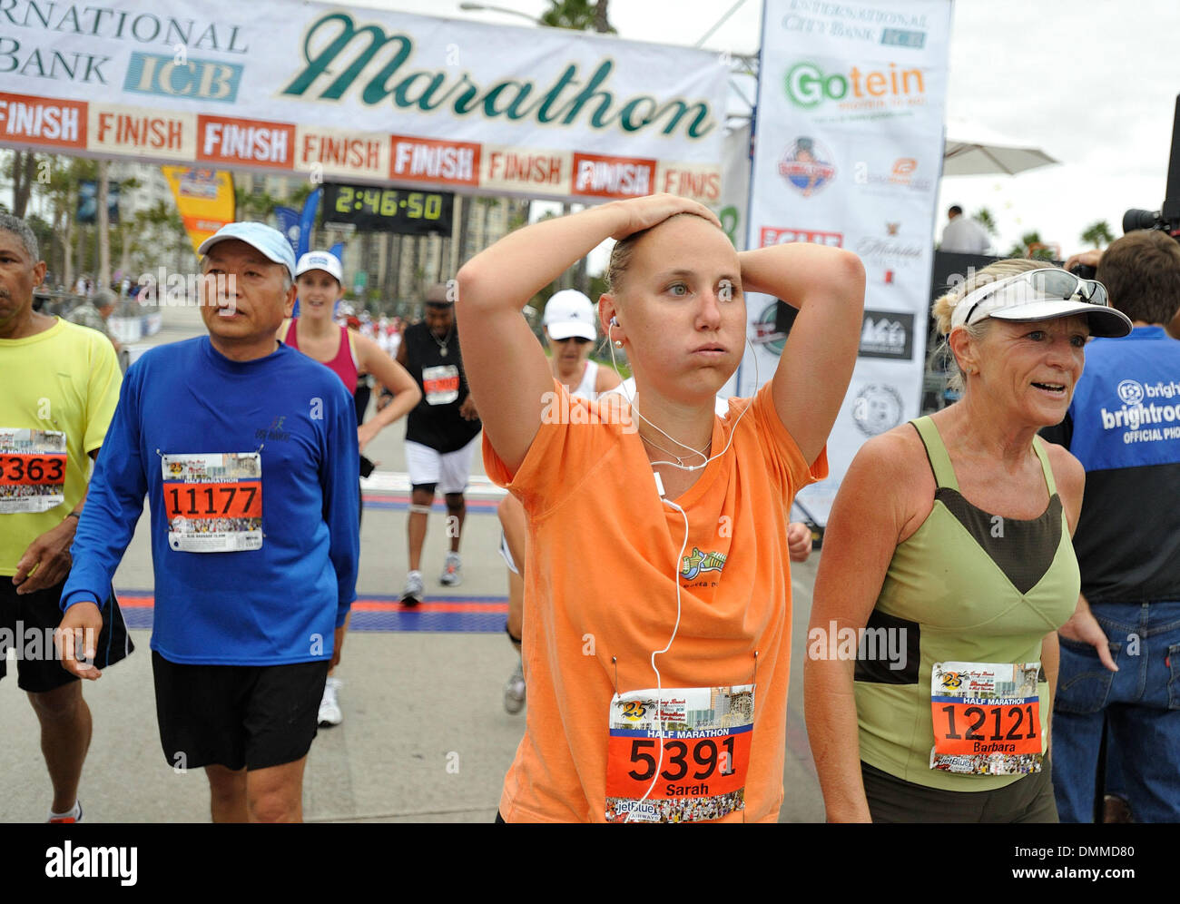 Oct 11, 2009 - Long Beach, California, USA - SARAH BADER (5391) finishes the half-marathon with a time of 2:32:35 during the 25th. Long Beach International City Bank Marathon on Sunday, October 11, 2009. (Credit Image: © Jeff Gritchen/ZUMA Press) Stock Photo