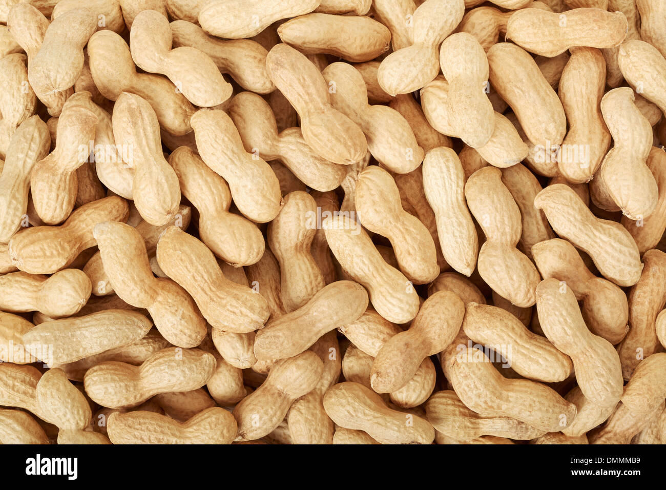 Peanuts in shell texture background Stock Photo Alamy