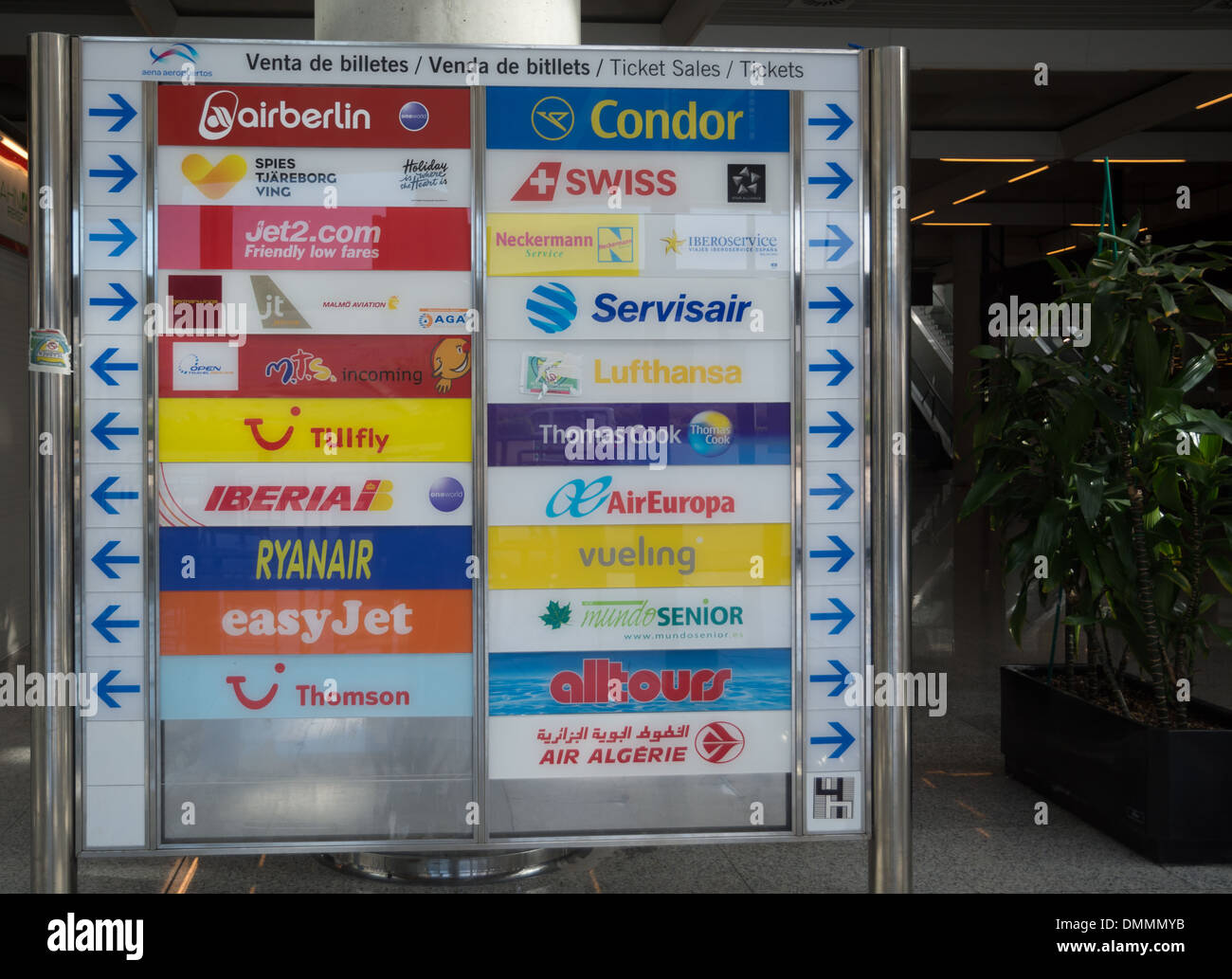 Travel agencies information board in Son Sant Joan airport, Palma de Mallorca, Spain in November 2013. Stock Photo