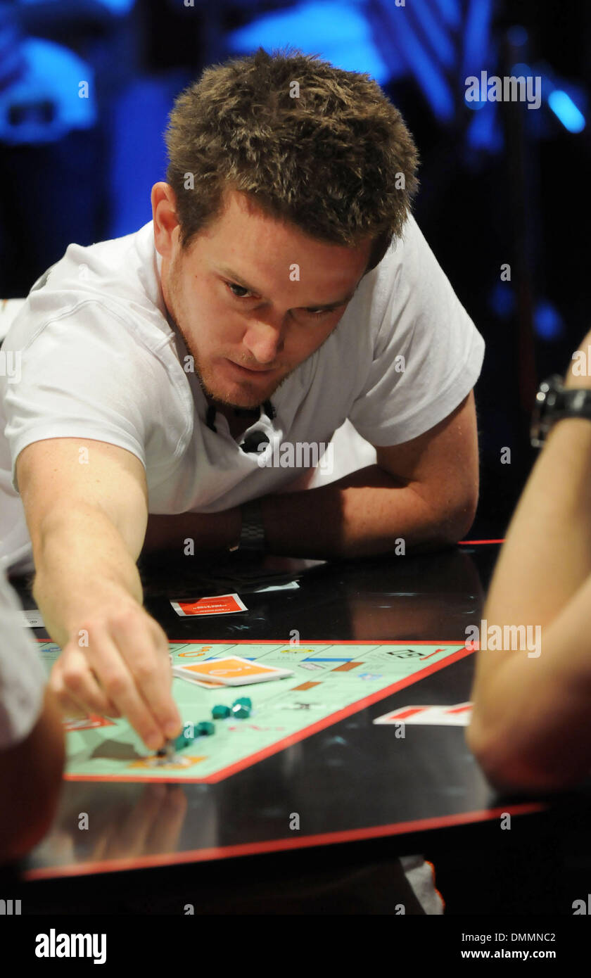 Oct 22, 2009 - Las Vegas, Nevada, USA - GEOFF CHRISTOPHER of New Zealand, moves his game piece around during the final round of the Monopoly World Championship.Forty-one of the world's best Monopoly players from 40 countries competed at the two-day event inside Caesars Palace.  (Credit Image: © David Becker/ZUMA Press) Stock Photo